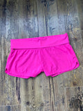 Short de sport rose fluo