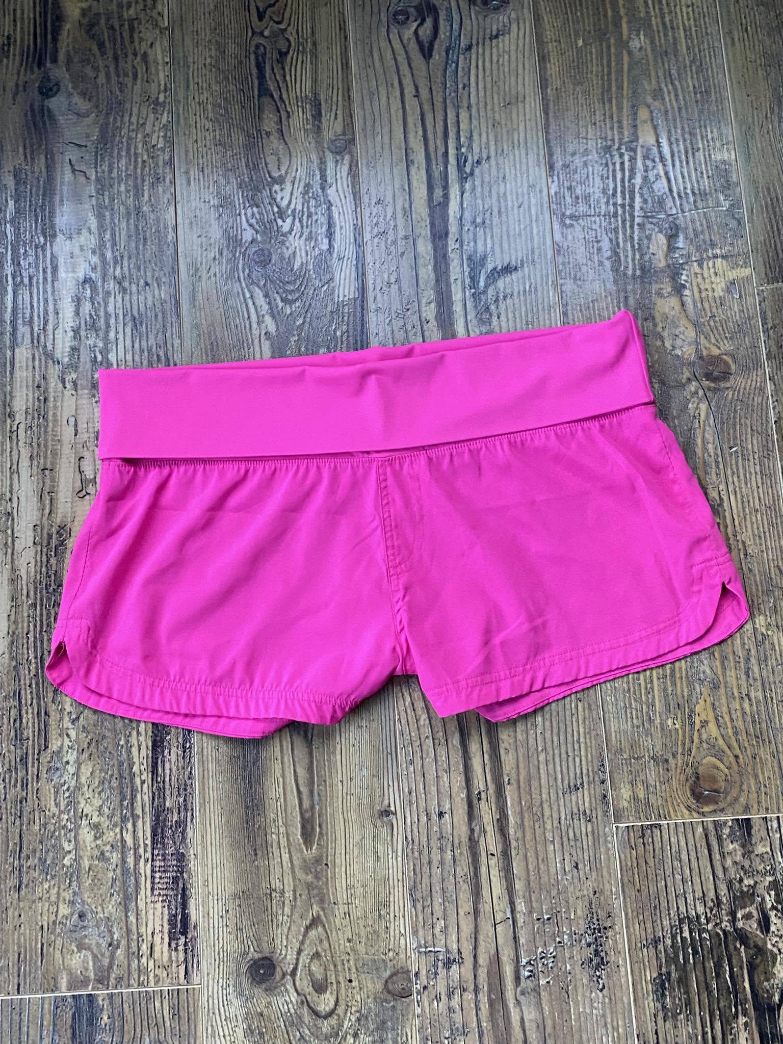 Short de sport rose fluo